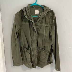 Woman’s green utility jacket
